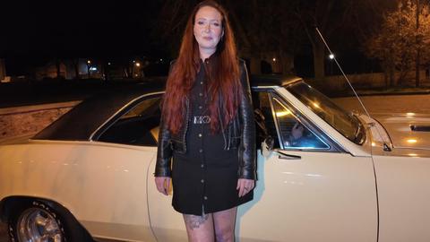 Watch this redhead MILF give a footjob in her bedroom