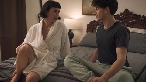 Taboo brunette mom and younger guy get messy in bed