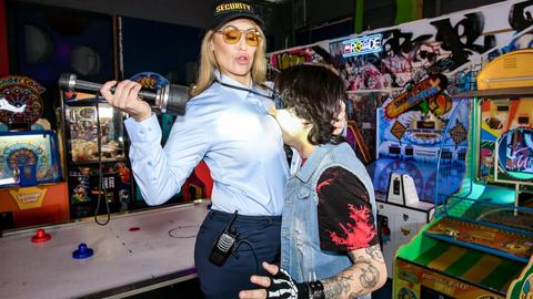 Busty blonde cop trades her uniform for a massive young cock